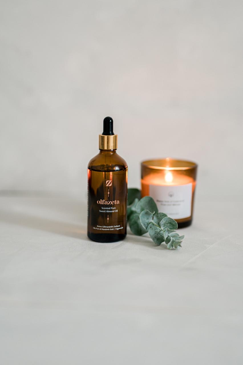 Huile d'amande douce Olfazeta avec bougie et eucalyptus