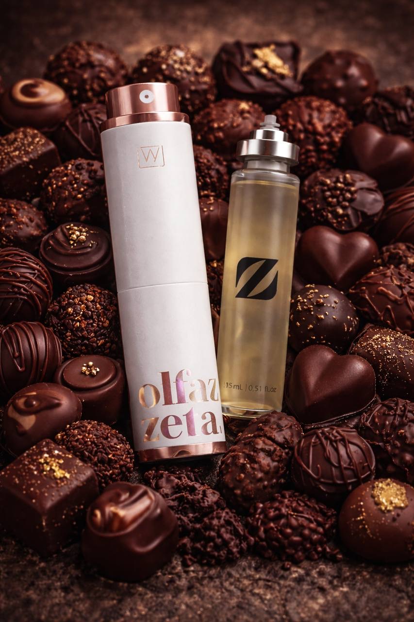 Parfum Olfazeta blanc rechargeable sur lit de chocolats
